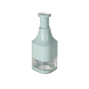 Hachoir à ail Menastyl en polypropylène vert menthe avec chambre transparente, vue de face sur fond blanc