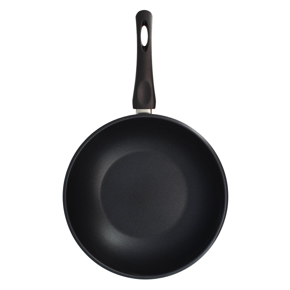 Wok First 28 cm en acier inoxydable avec revêtement antiadhésif noir, vue intérieure avec manche ergonomique