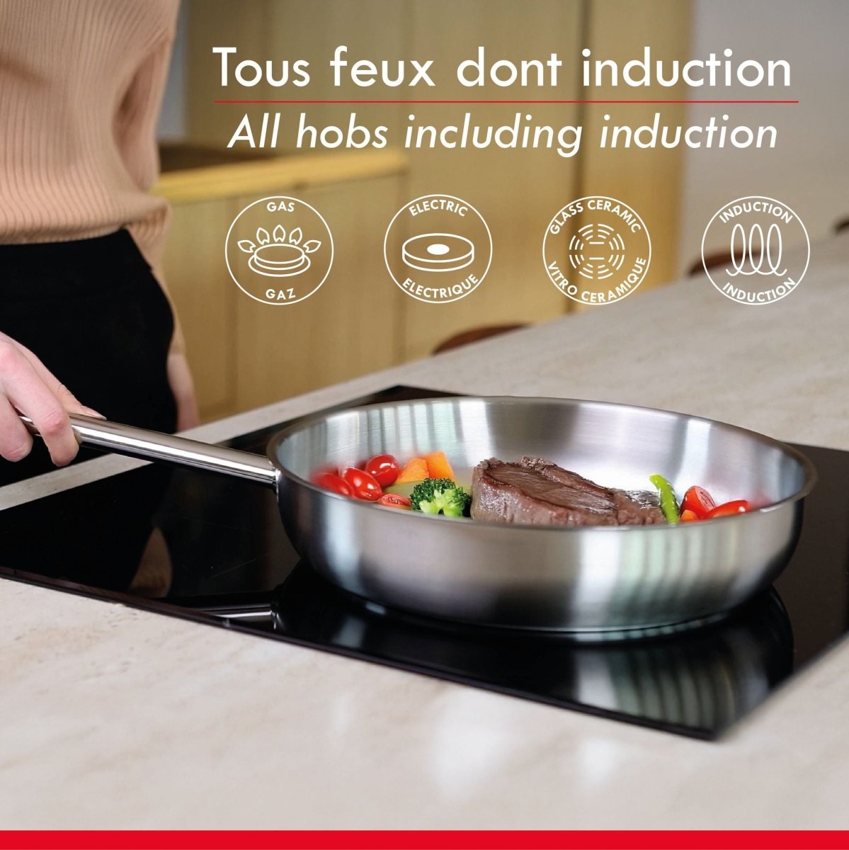 Wok professionnel inox 30cm utilisé sur plaque induction pour cuire viande et légumes colorés