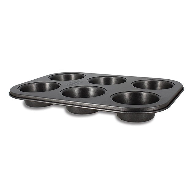 Moule à 6 muffins Amandine Menastyl en acier carbone noir antiadhésif, vue de trois quarts sur fond blanc